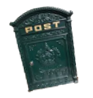 A miniature green post box